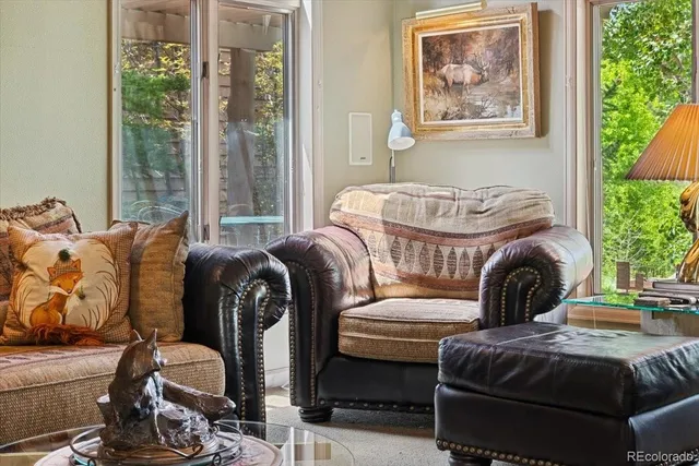 a bedroom with furniture and a fireplace