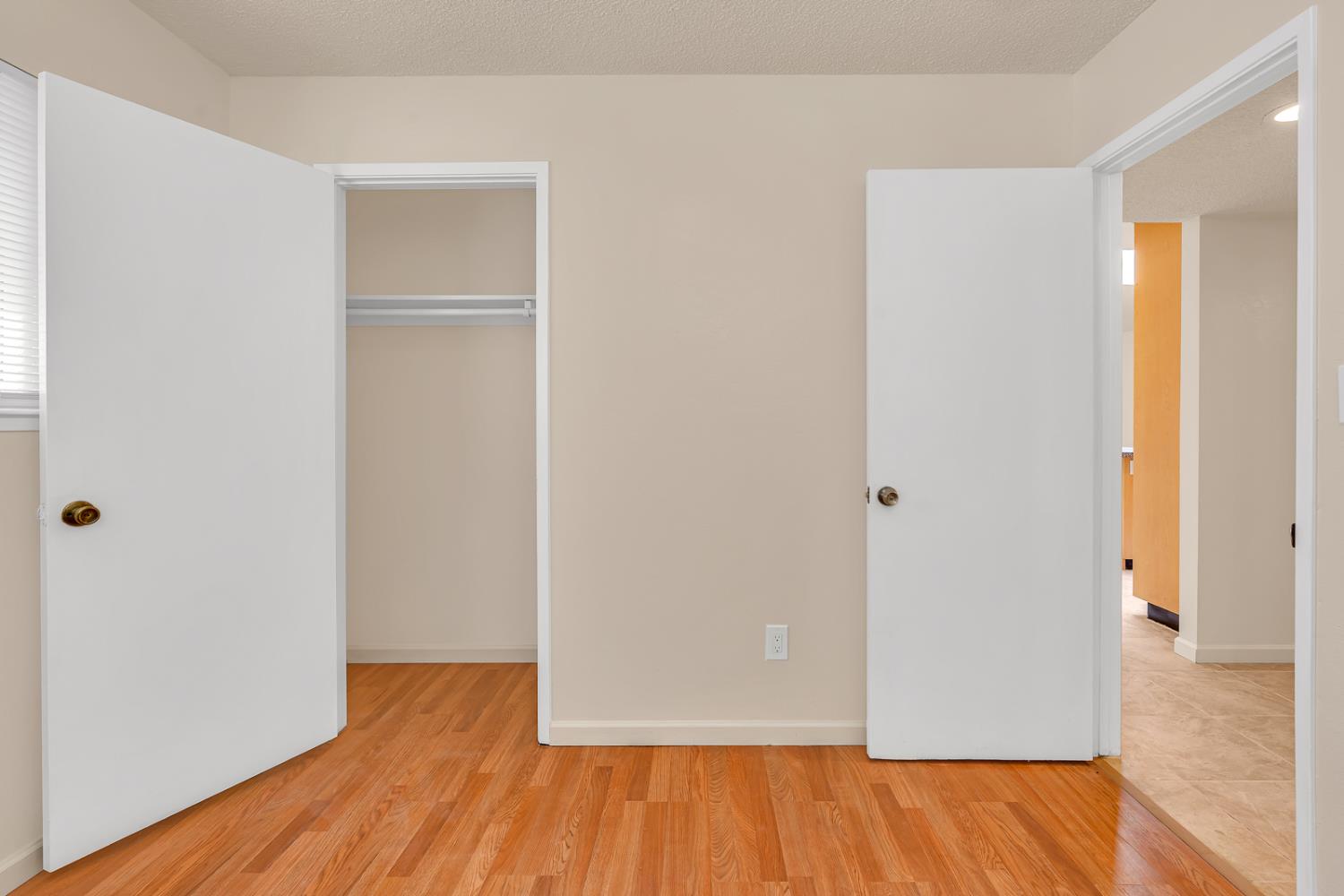 200 Dorita Way Modesto, CA 95354 - Photo 23 of 37 a view of an empty room with wooden floor