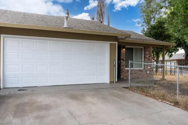 a view of outdoor space garage and window