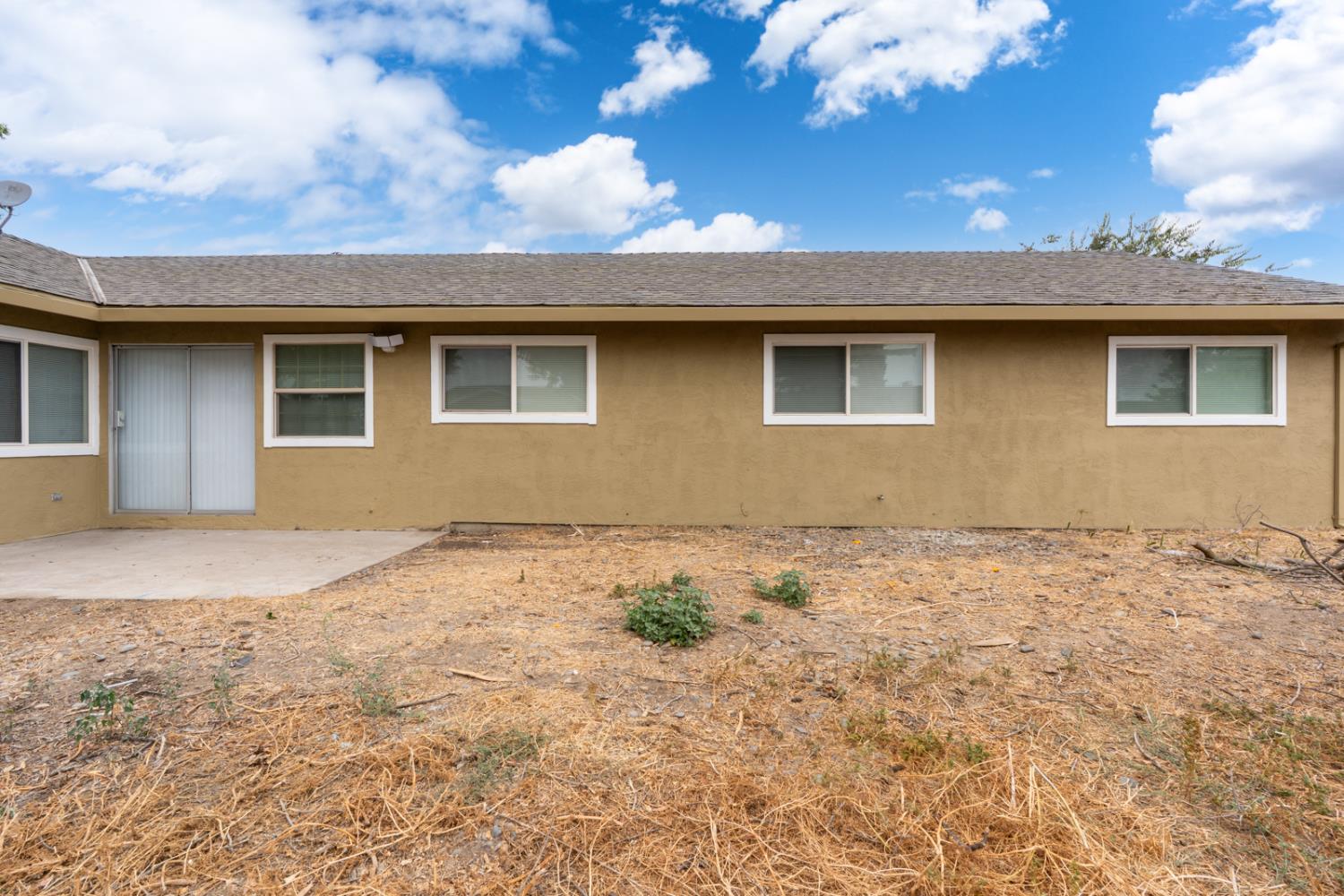 200 Dorita Way Modesto, CA 95354 - Photo 33 of 37 a house that has a tree in front of it