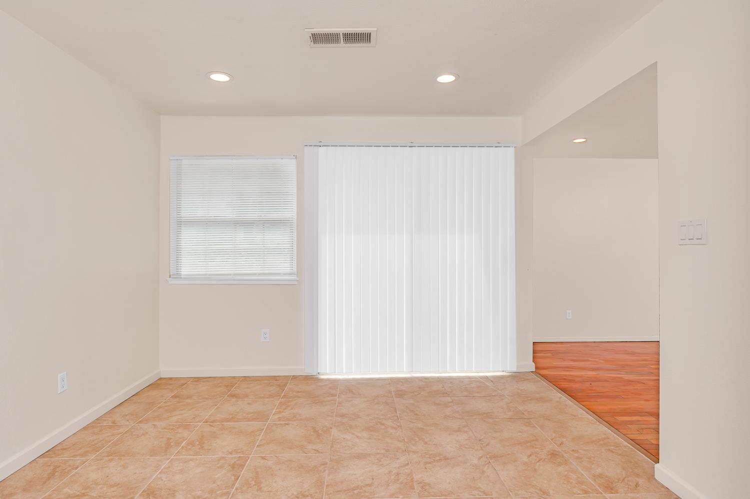 200 Dorita Way Modesto, CA 95354 - Photo 10 of 37 an empty room with windows