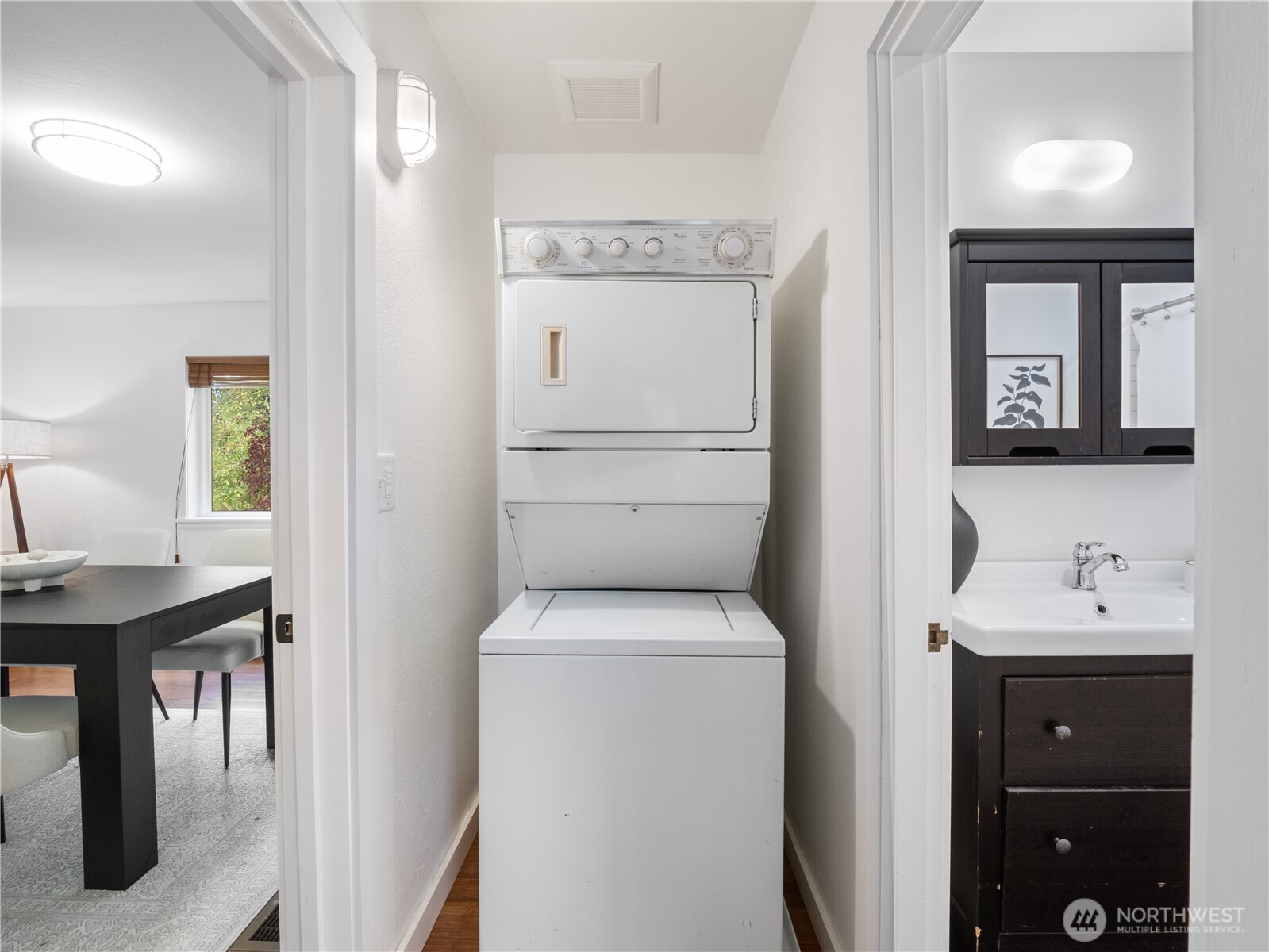 11640 59th Avenue South Seattle, WA 98178 - Photo 14 of 33 a bathroom with a toilet a sink and mirror