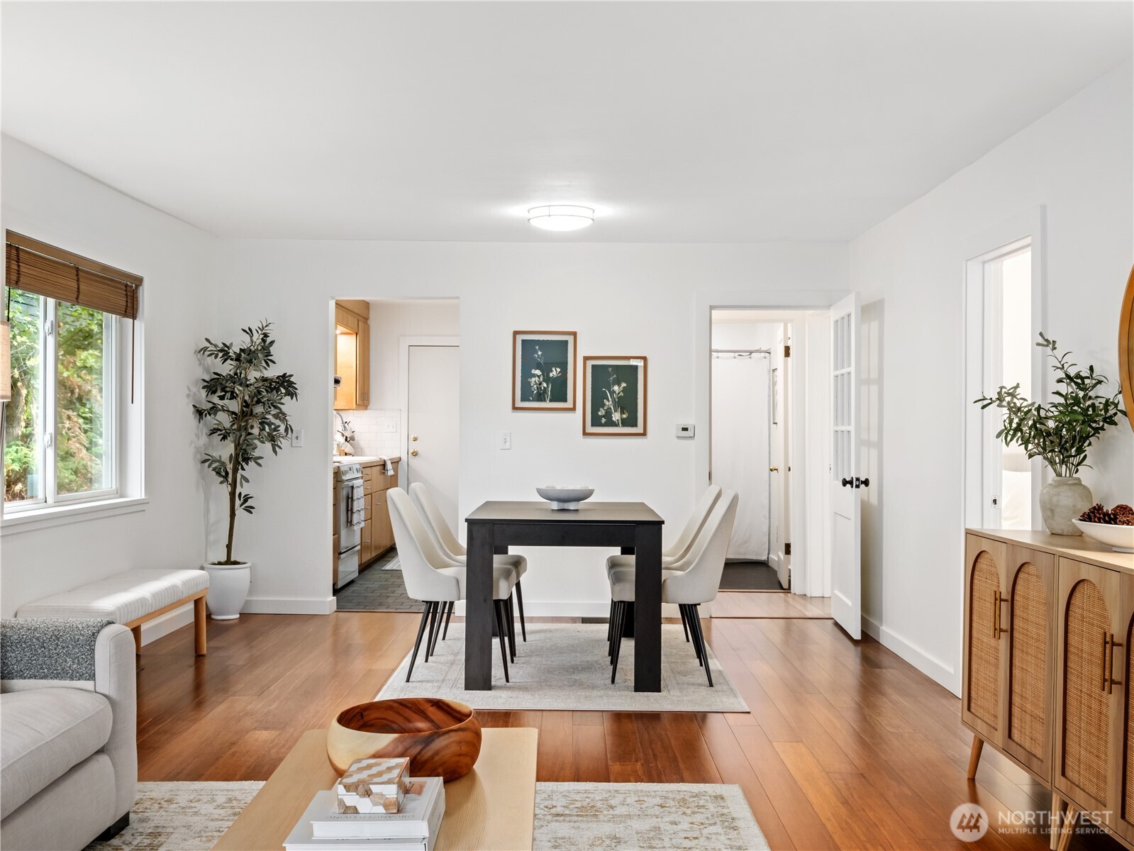 11640 59th Avenue South Seattle, WA 98178 - Photo 20 of 33 a dining room with furniture potted plants and wooden floor