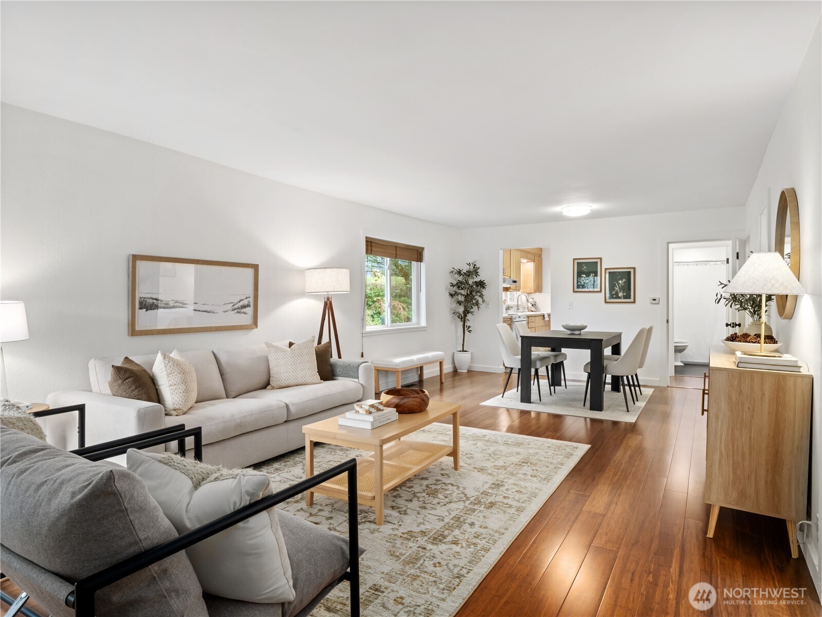 11640 59th Avenue South Seattle, WA 98178 - Photo 3 of 33 a living room with furniture and wooden floor