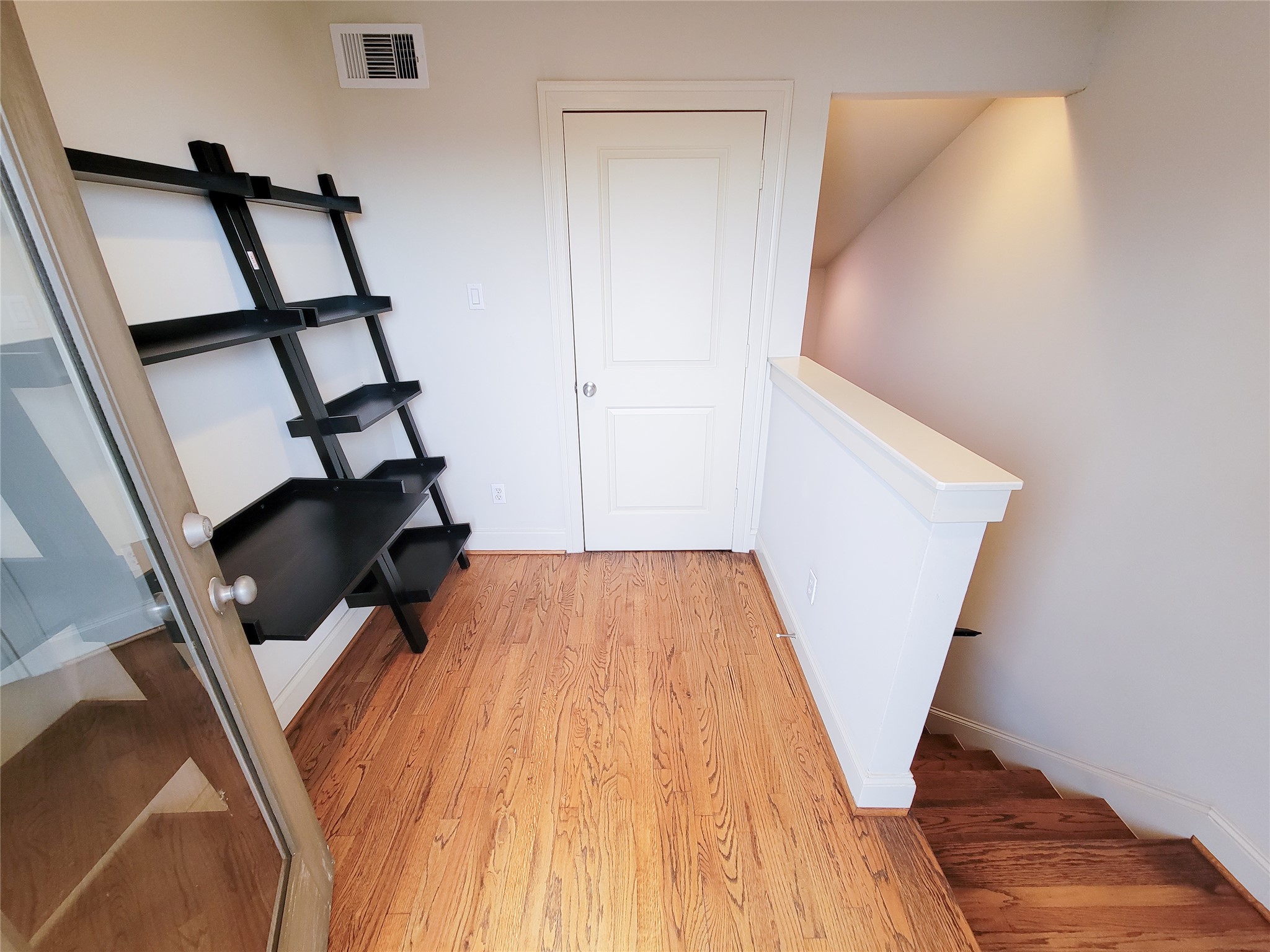 1602 White Street Houston, TX 77007 - Photo 33 of 41 a view of a hardwood floor and staircase