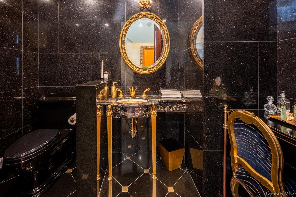 1331 Harbor Road Hewlett, NY 11557 - Photo 19 of 50 Bathroom with tile walls and vanity