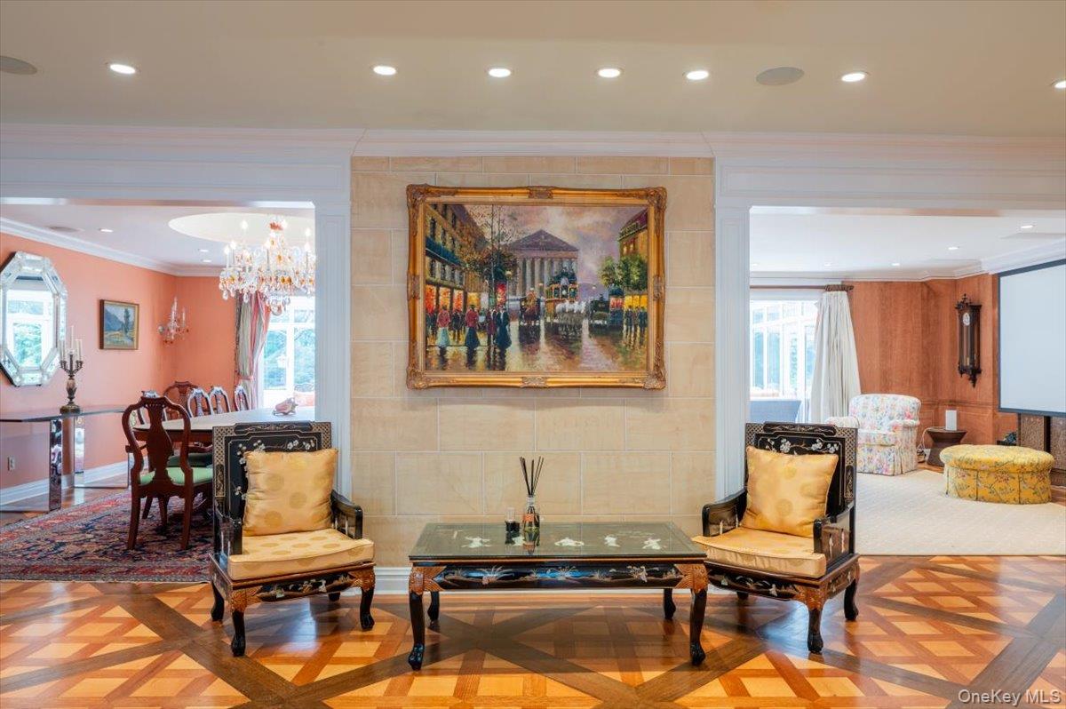 1331 Harbor Road Hewlett, NY 11557 - Photo 8 of 50 Living area featuring recessed lighting, ornamental molding, and a chandelier