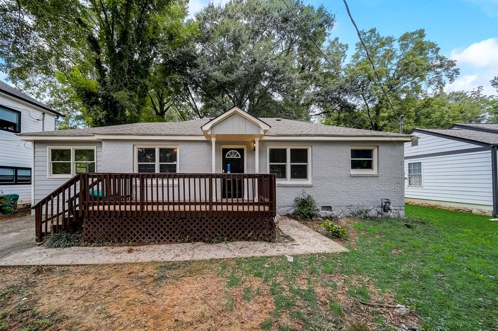 1951 Meadow Lane Decatur, GA 30032 - Photo 1 of 1 a front view of a house with a garden