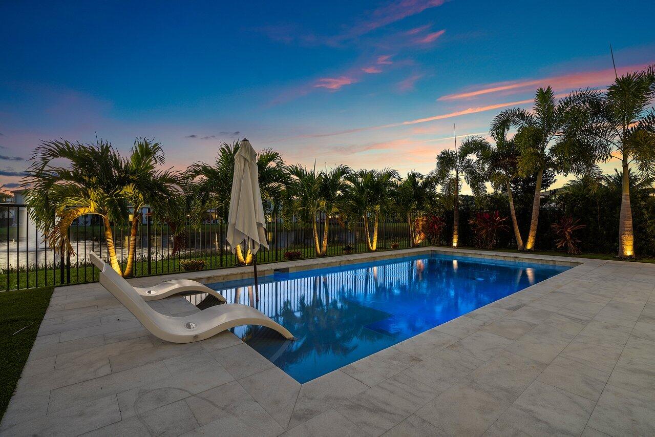8092 Laurel Falls Drive Boca Raton, FL 33496 - Photo 37 of 62 a view of swimming pool with outdoor seating and plants