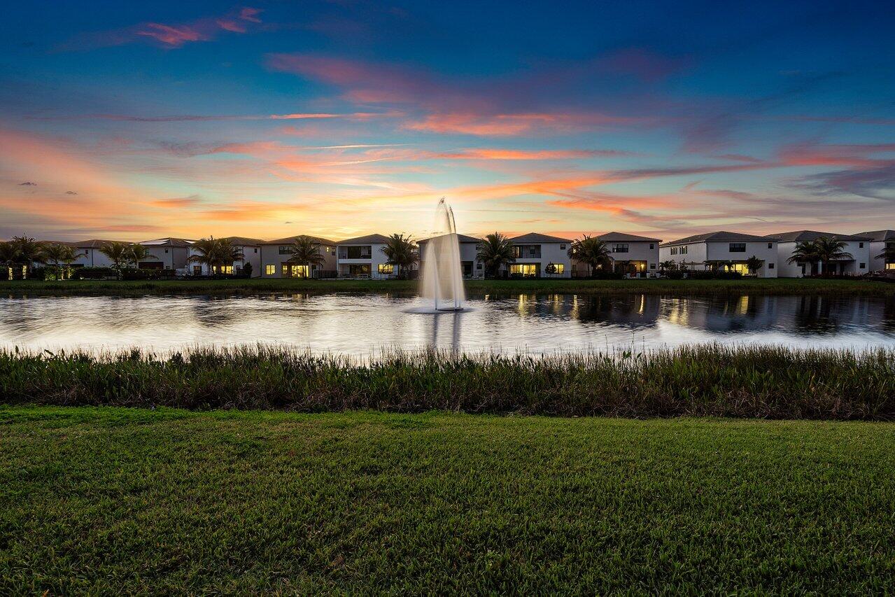8092 Laurel Falls Drive Boca Raton, FL 33496 - Photo 40 of 62 a view of a lake with houses in the back