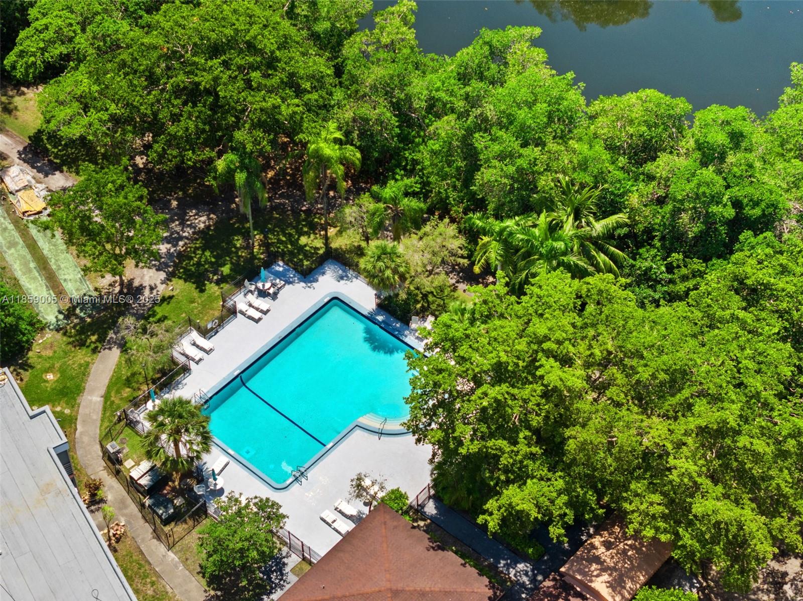 17890 West Dixie Highway, Unit 603 Miami, FL 33160 - Photo 26 of 34 an aerial view of a house with a yard and garden