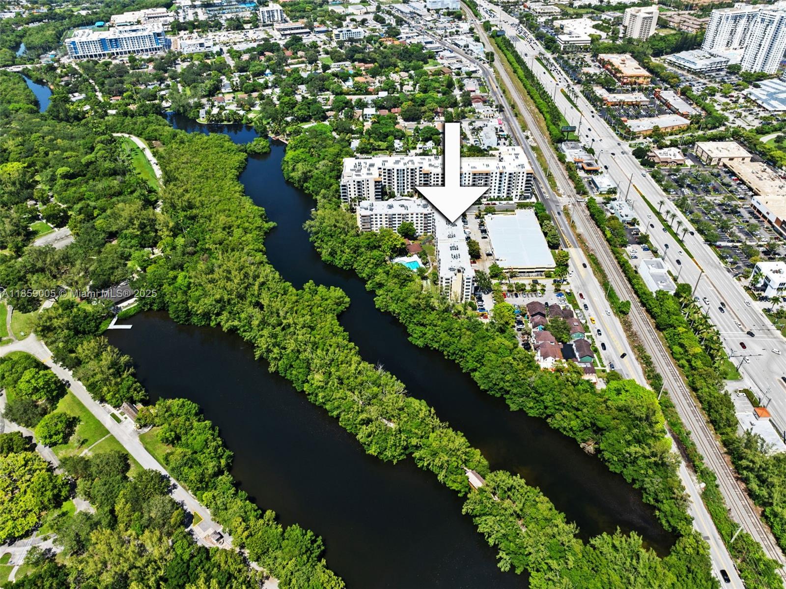 17890 West Dixie Highway, Unit 603 Miami, FL 33160 - Photo 30 of 34 an aerial view of residential houses with outdoor space