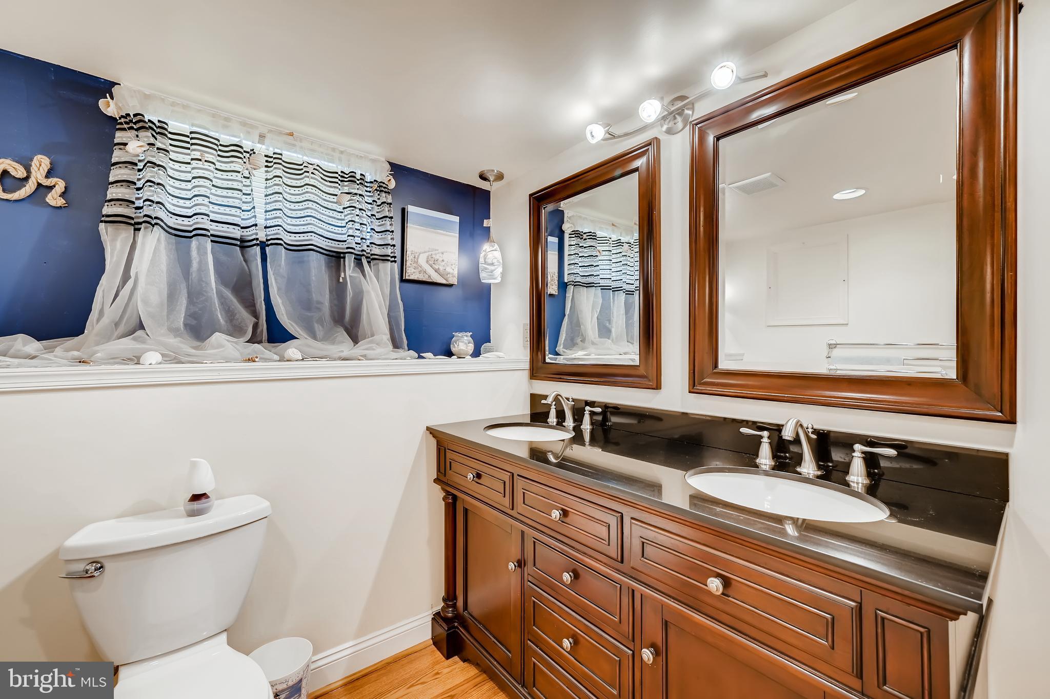 820 Martin Road Baltimore, MD 21221 - Photo 26 of 50 Lower Level Bathroom w/ Dual Sinks