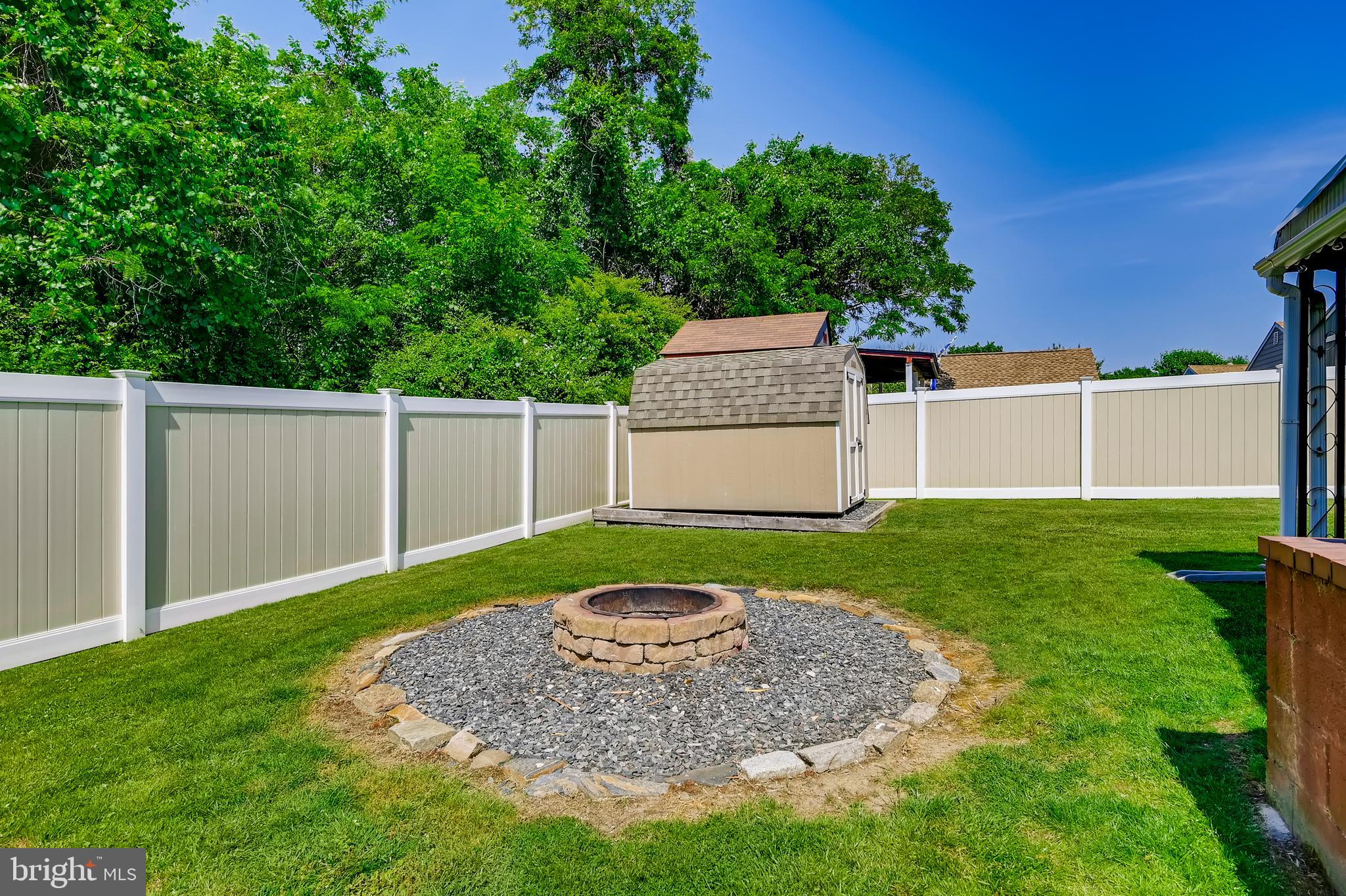 820 Martin Road Baltimore, MD 21221 - Photo 4 of 50 Fire Pit w/ Privacy Fence and storage shed