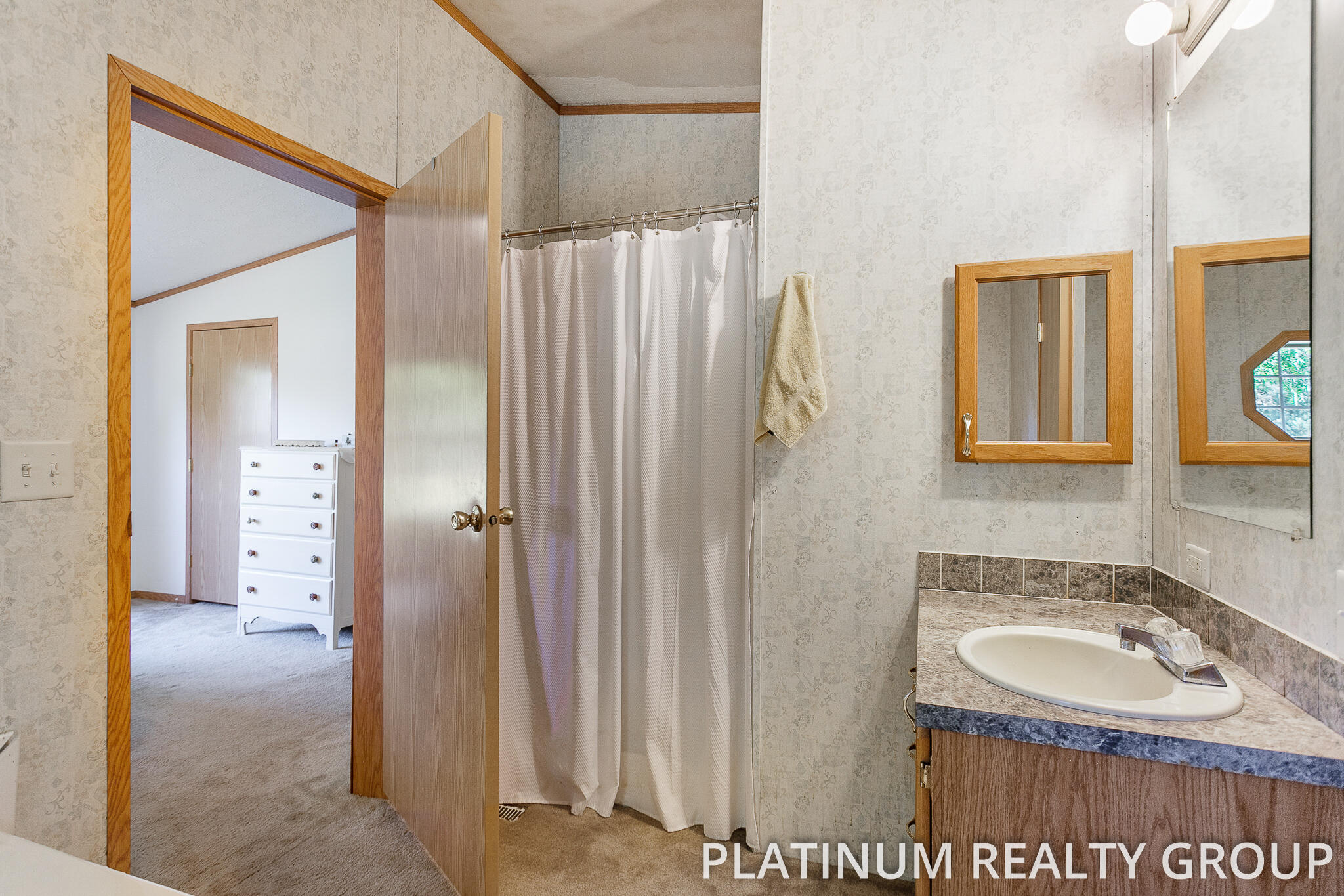 7335 South Maple Island Road Nunica, MI 49448 - Photo 4 of 26 Primary Bath