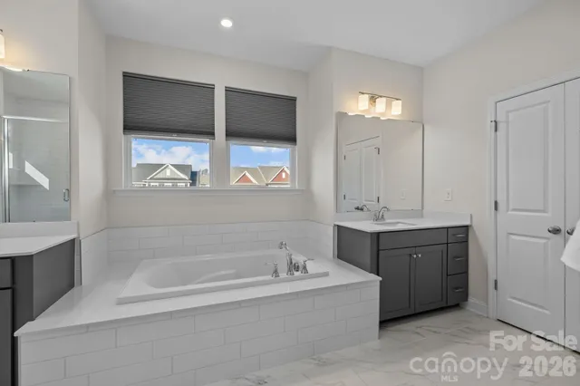 a view of a patio with table and chairs