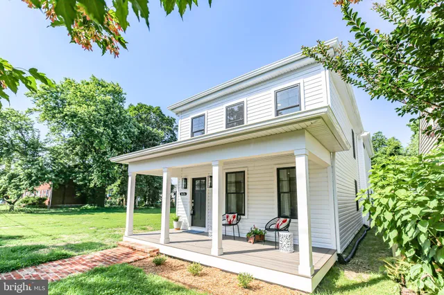 a house view with a garden space