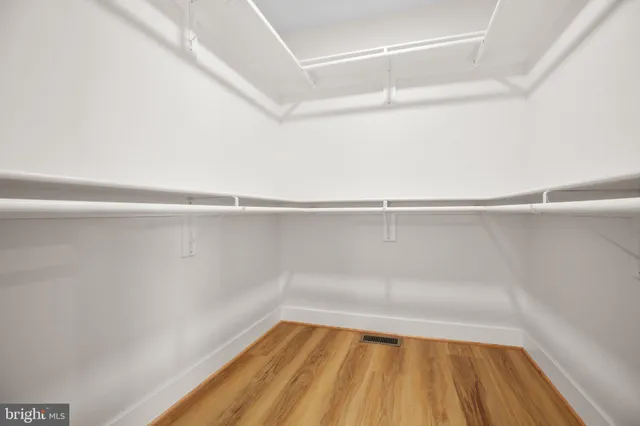 a view of a room with racks on the wall