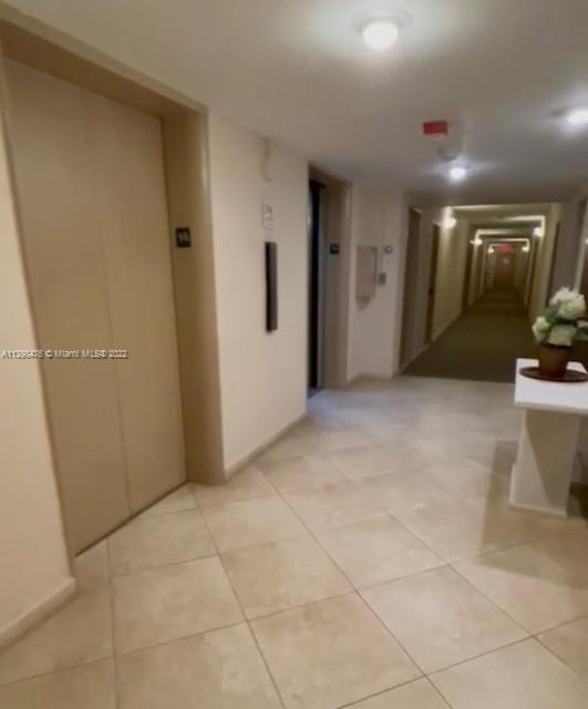 9225 Collins Avenue, Unit 1407 Surfside, FL 33154 - Photo 1 of 7 a view of a big room with closet and mirrors