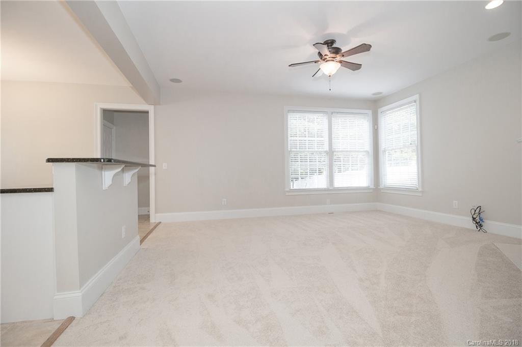 1376 Barnett Woods Fort Mill, SC 29708 - Photo 18 of 34 wooden floor in an empty room with a window