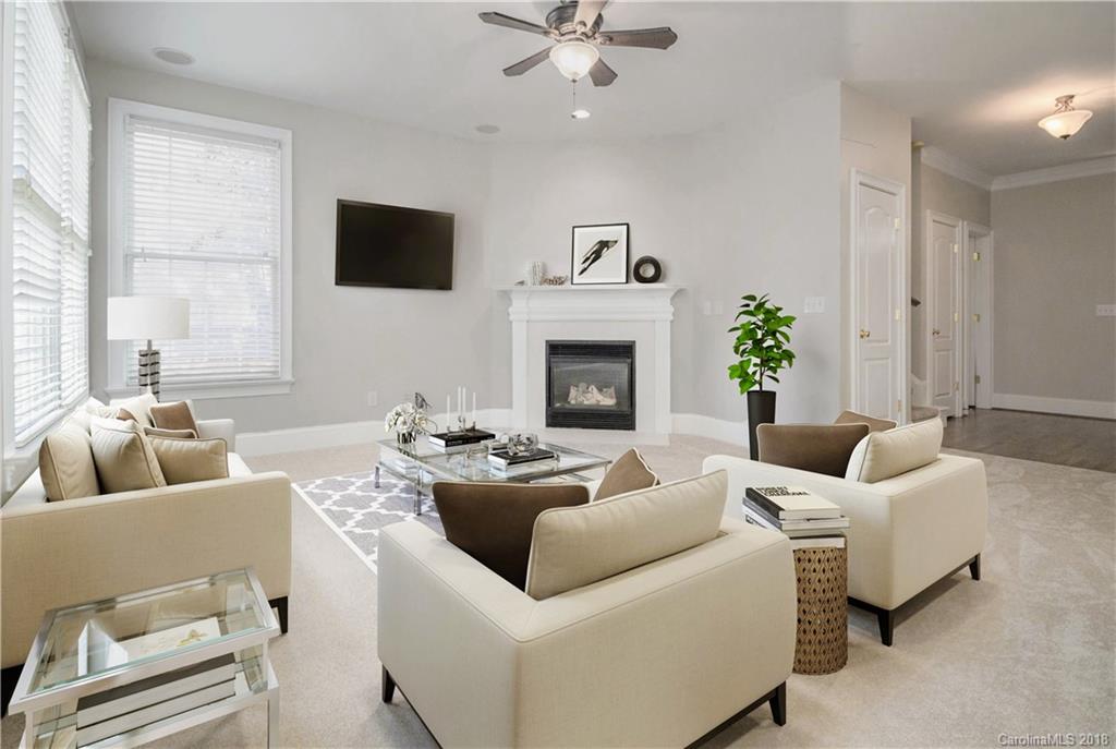 1376 Barnett Woods Fort Mill, SC 29708 - Photo 6 of 34 a living room with furniture and a flat screen tv