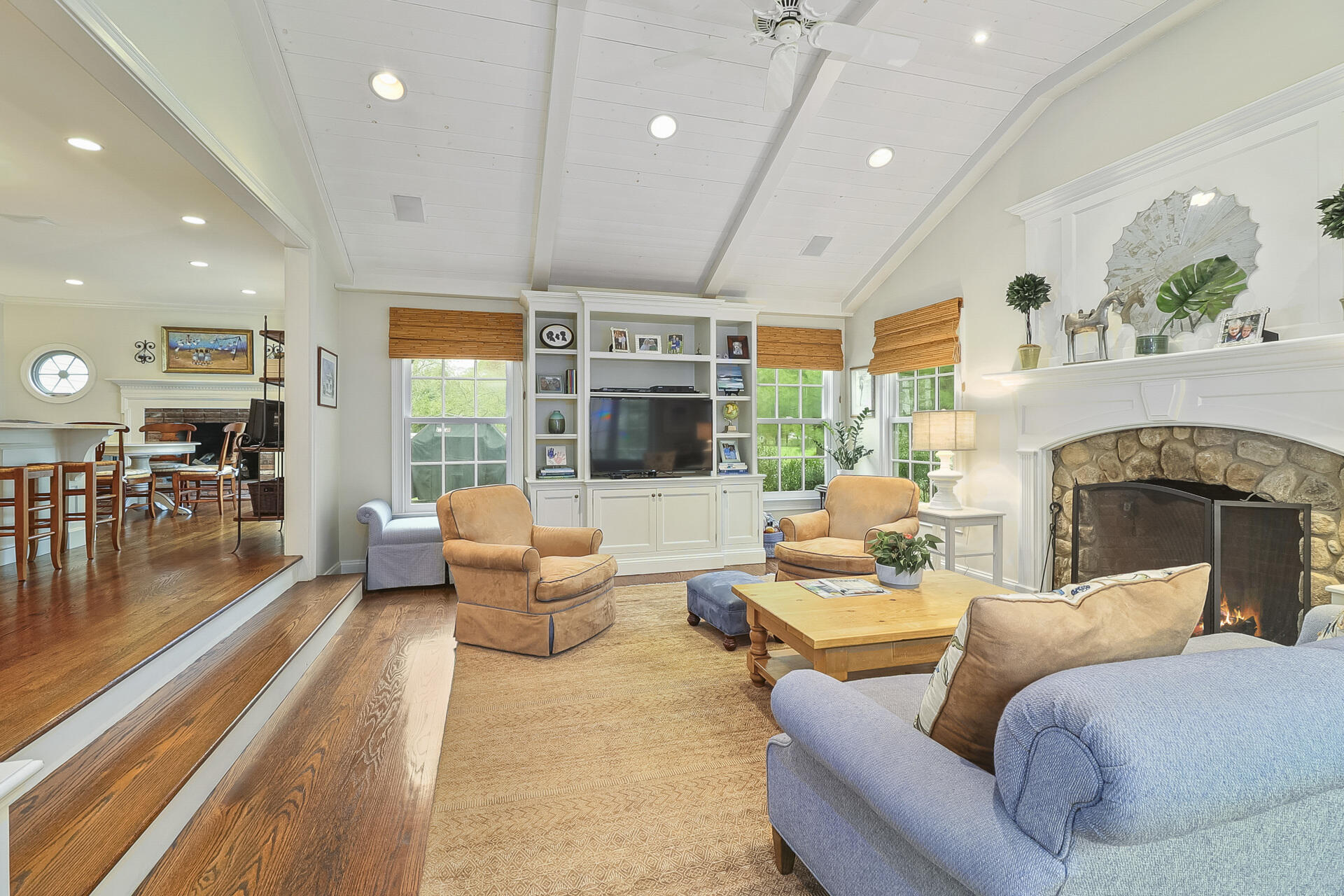 37 Red Rose Circle Darien, CT 06820 - Photo 14 of 40 a living room with furniture fireplace and a large window