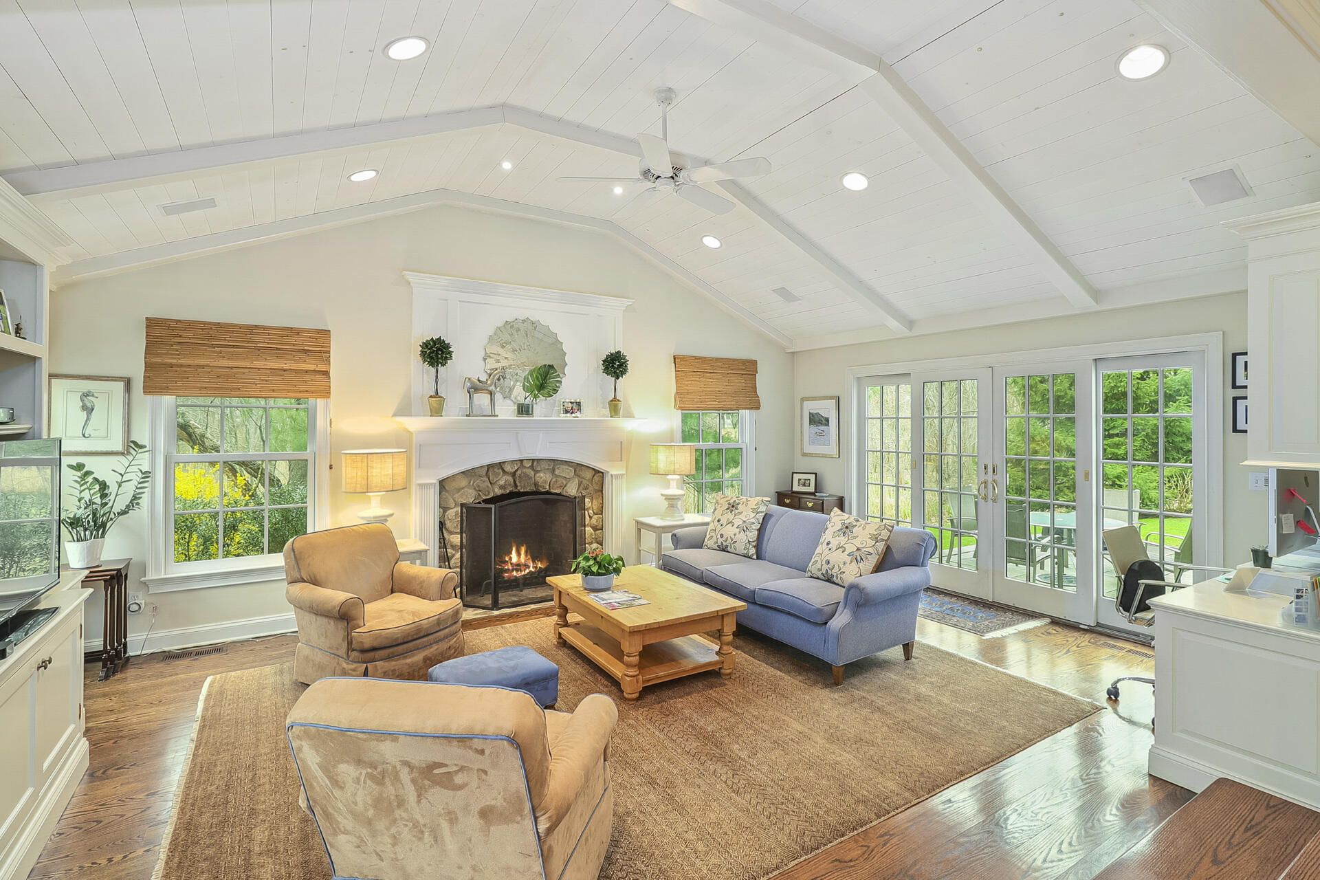 37 Red Rose Circle Darien, CT 06820 - Photo 15 of 40 a living room with furniture and a fireplace