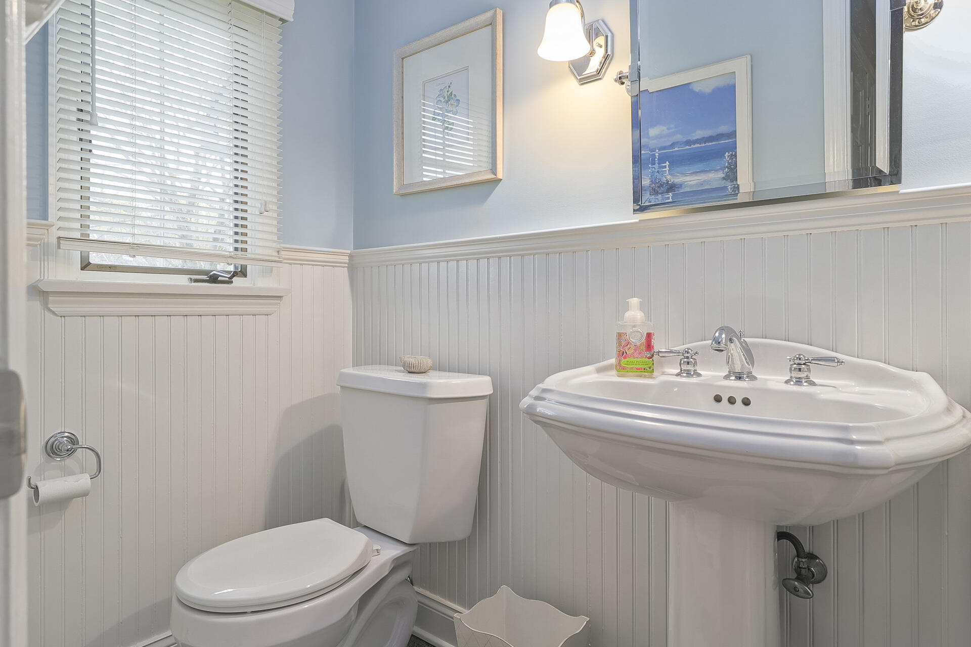 37 Red Rose Circle Darien, CT 06820 - Photo 17 of 40 a white sink sitting next to a white toilet