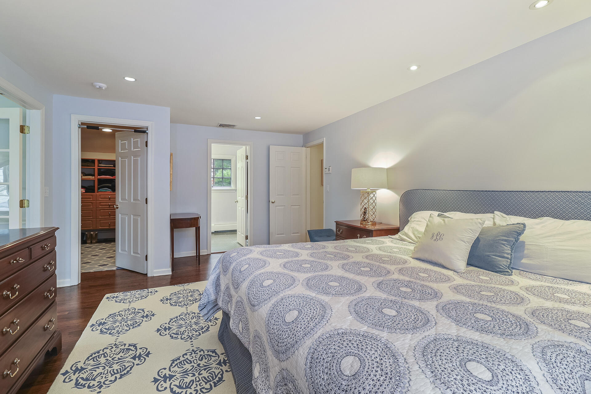 37 Red Rose Circle Darien, CT 06820 - Photo 19 of 40 a bedroom with a large bed and a dresser