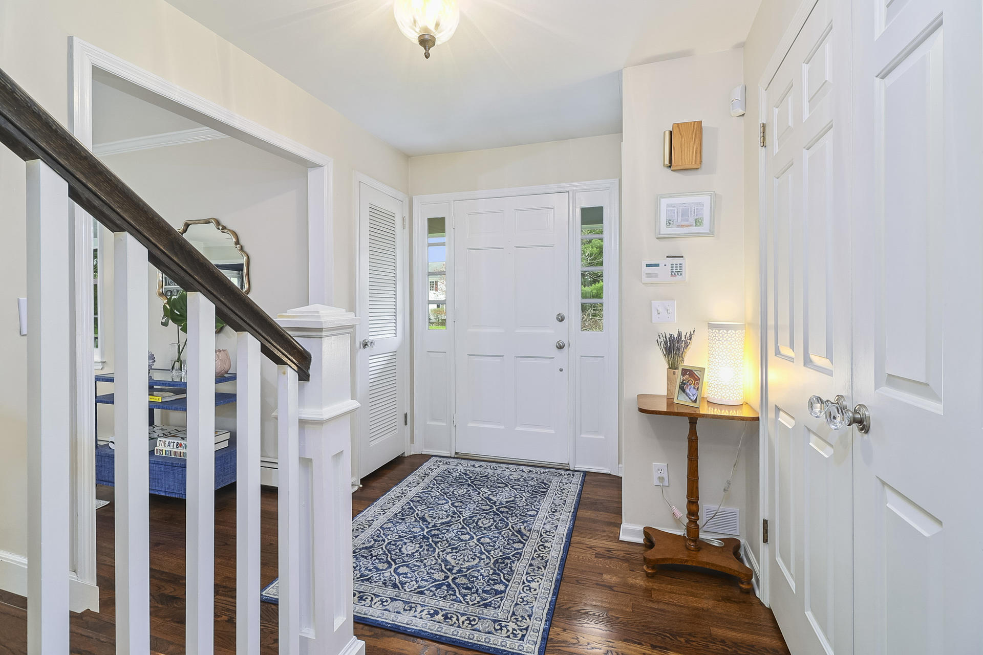 37 Red Rose Circle Darien, CT 06820 - Photo 3 of 40 a view of entryway with stairs and wooden floor
