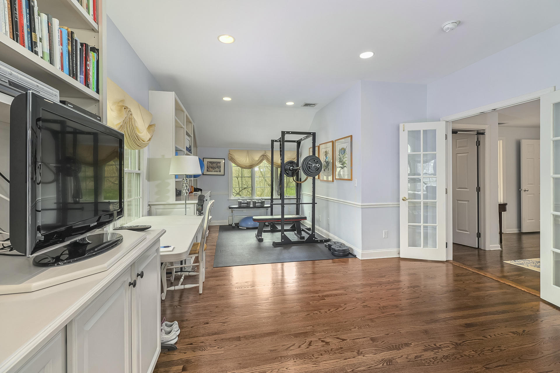 37 Red Rose Circle Darien, CT 06820 - Photo 21 of 40 a view of a living room kitchen and a wooden floor