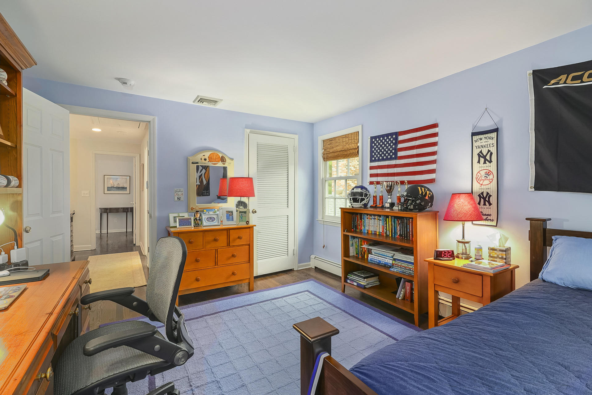37 Red Rose Circle Darien, CT 06820 - Photo 24 of 40 a living room with furniture and a flat screen tv