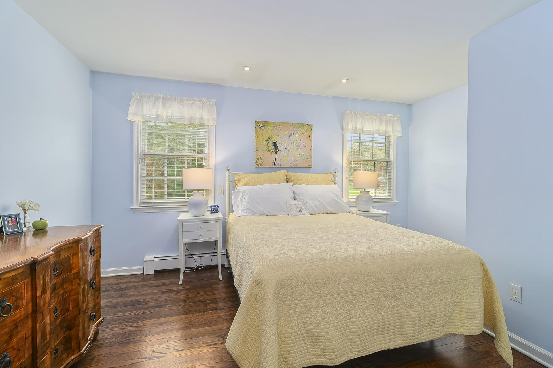 37 Red Rose Circle Darien, CT 06820 - Photo 27 of 40 a bed sitting in a bedroom next to a window