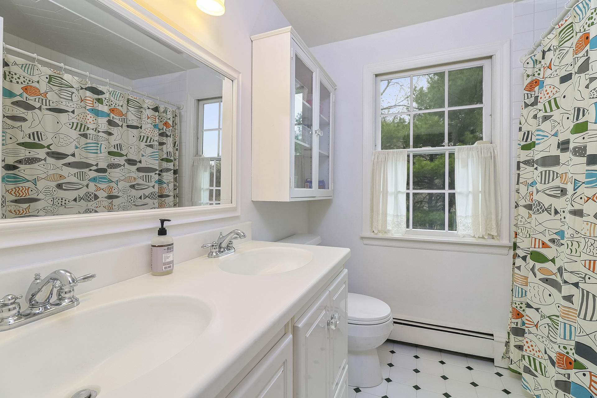37 Red Rose Circle Darien, CT 06820 - Photo 29 of 40 a bathroom with a sink toilet and window