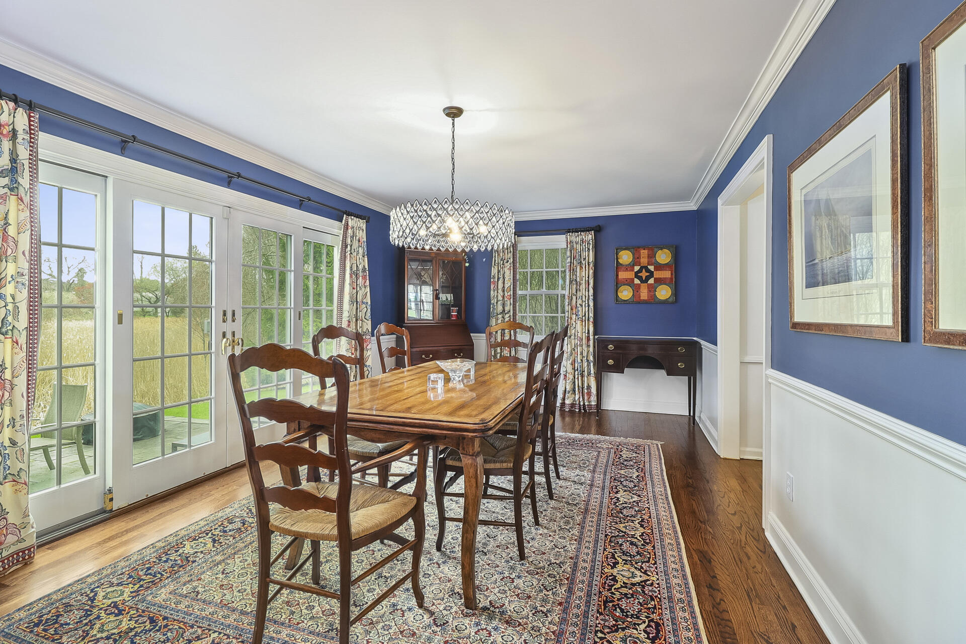 37 Red Rose Circle Darien, CT 06820 - Photo 7 of 40 a view of a dining room with furniture window and wooden floor