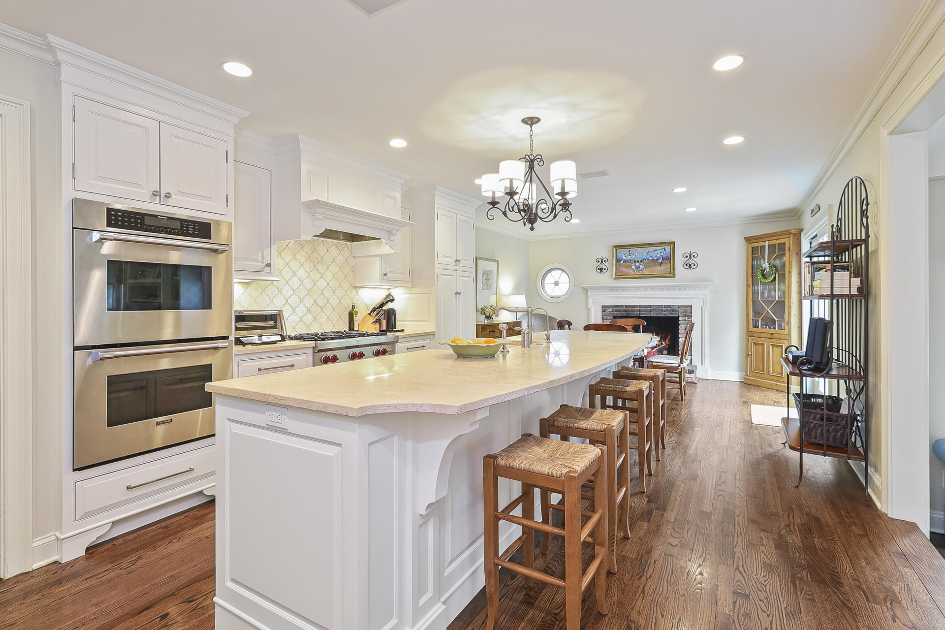 37 Red Rose Circle Darien, CT 06820 - Photo 8 of 40 a kitchen with stainless steel appliances kitchen island granite countertop a sink and cabinets