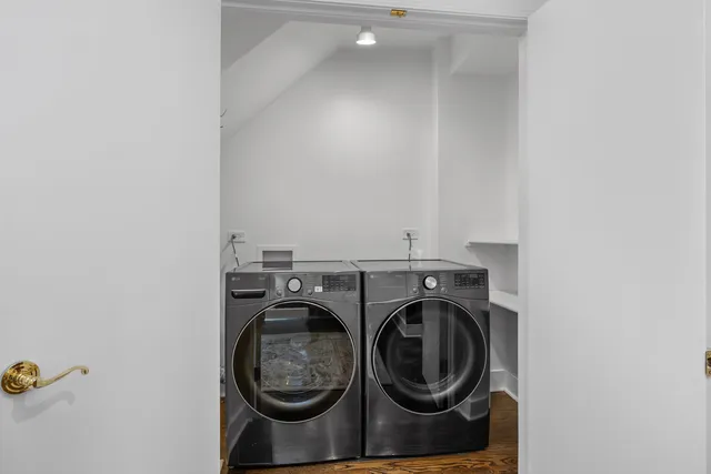 a view of a chairs and table in the patio with a backyard
