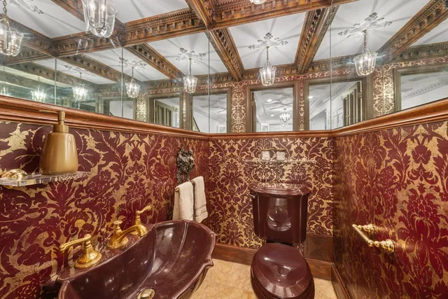 a front view of a house with a large window