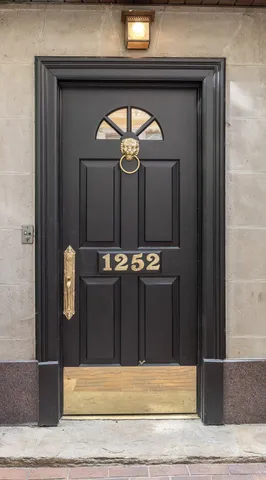 a view of a entryway door of a house
