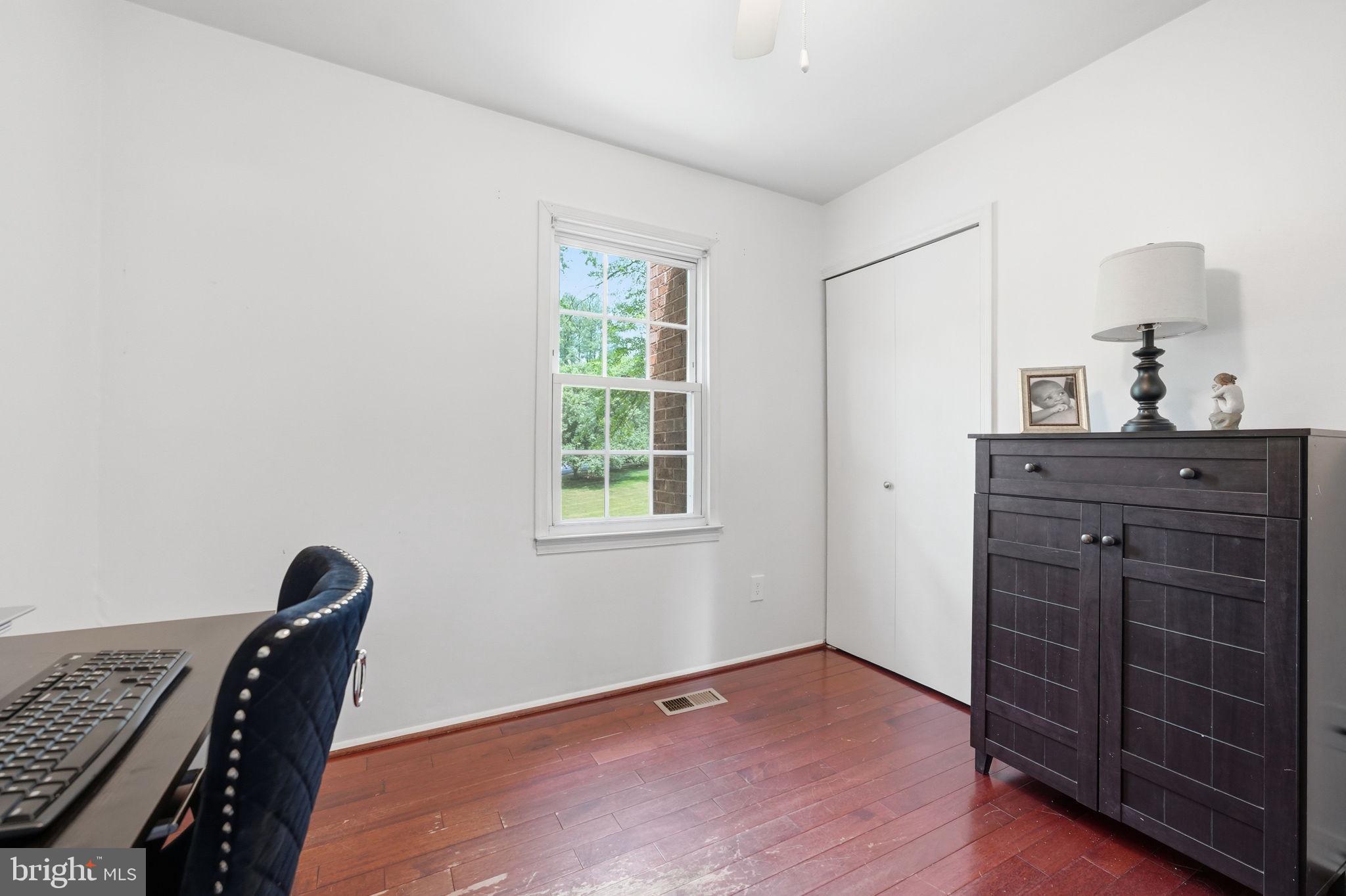 8260 Getty Court Springfield, VA 22153 - Photo 16 of 31 a workspace with furniture and window