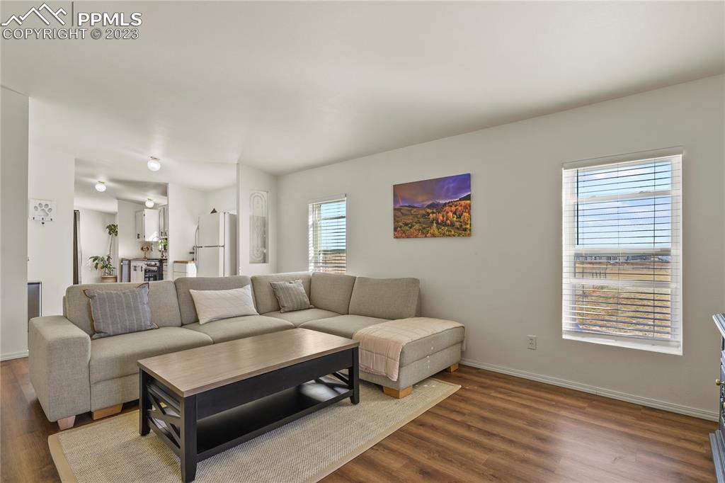 17755 Sage Crest Road Peyton, CO 80831 - Photo 15 of 37 a living room with furniture and a window