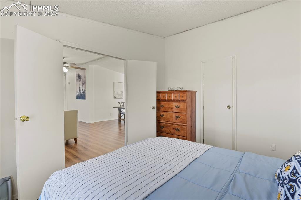 17755 Sage Crest Road Peyton, CO 80831 - Photo 22 of 37 a bedroom with a bed and a closet