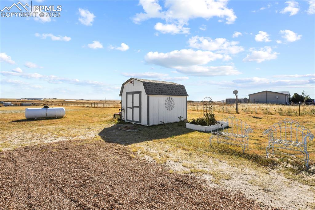 17755 Sage Crest Road Peyton, CO 80831 - Photo 30 of 37 a view of a ocean with beach