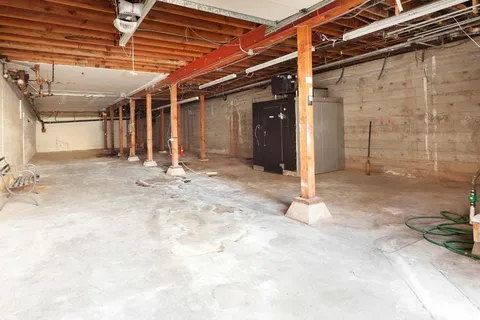 a view of a room with wooden walls