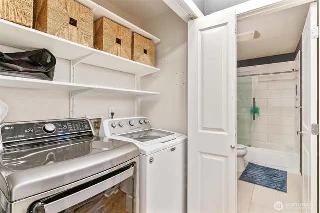 a utility room with dryer and washer