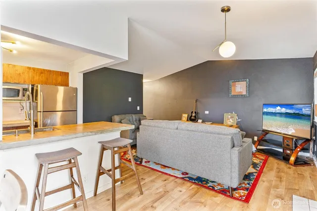 a room with furniture and a flat screen tv