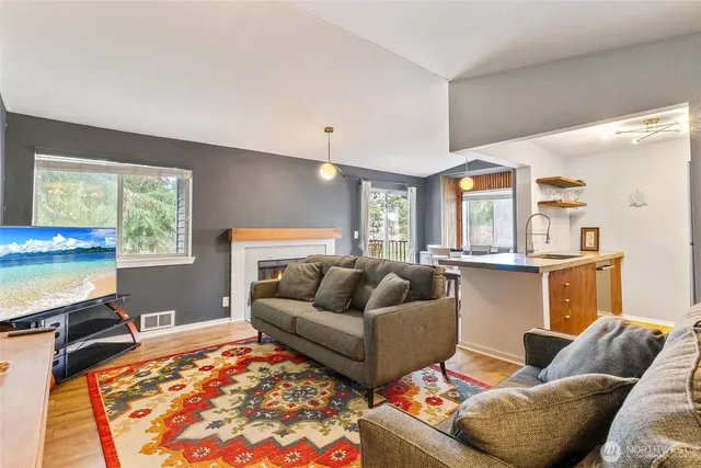 a living room with furniture and a couch