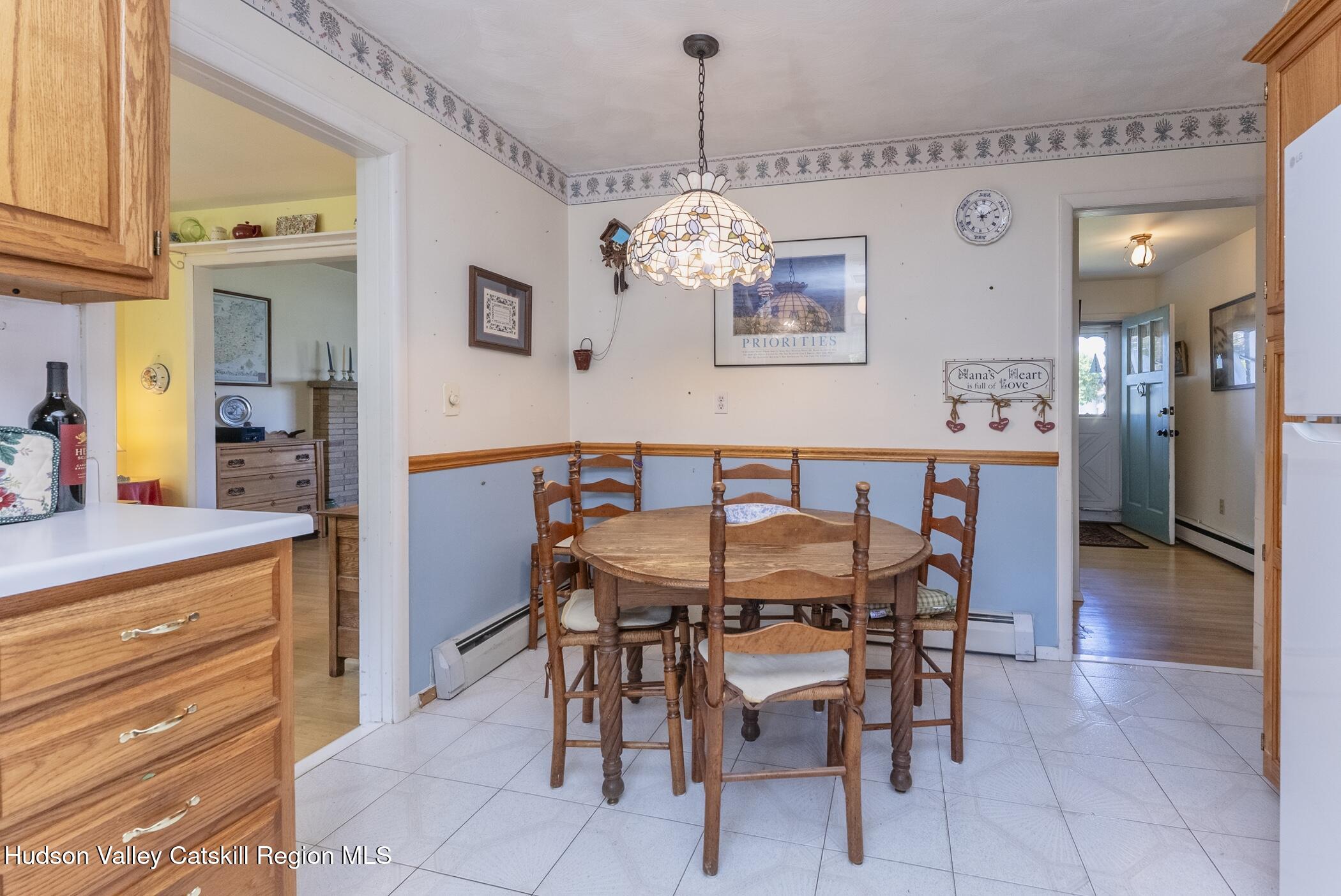 70 Ringtop Road Kingston, NY 12401 - Photo 14 of 47 a dining room with furniture and chandelier