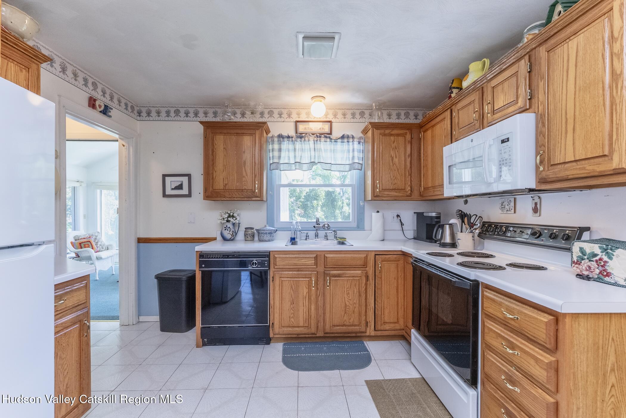70 Ringtop Road Kingston, NY 12401 - Photo 15 of 47 a kitchen with stainless steel appliances a stove sink and cabinets