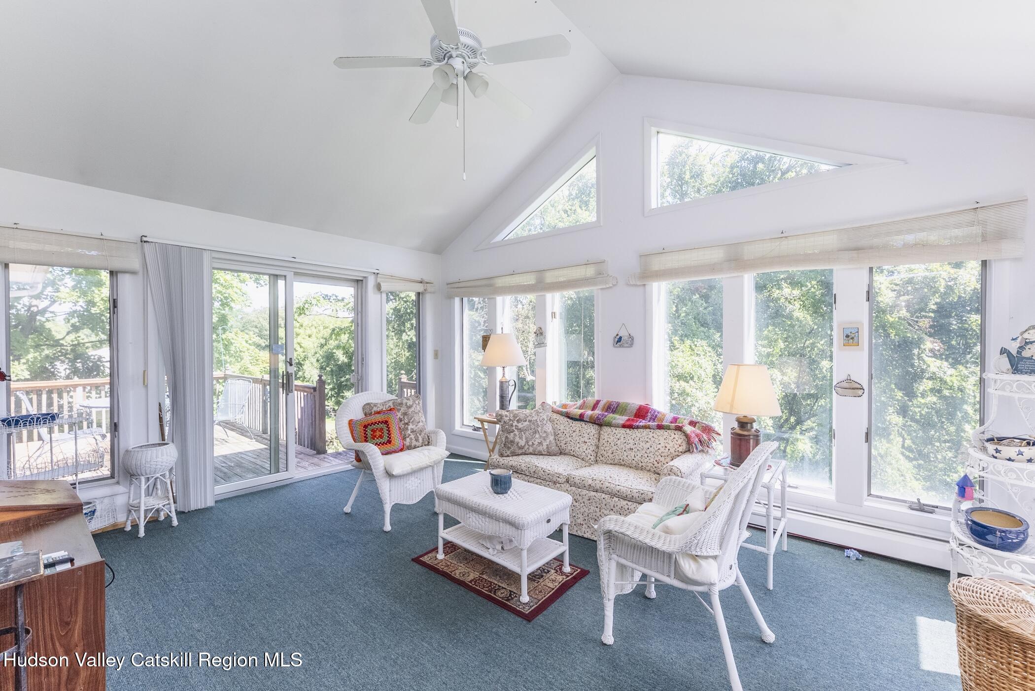 70 Ringtop Road Kingston, NY 12401 - Photo 19 of 47 a living room with furniture and large windows